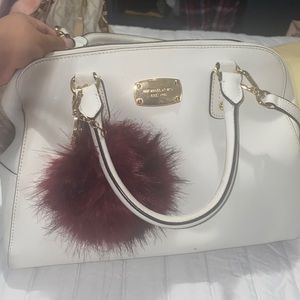 White handbag with matching wallet